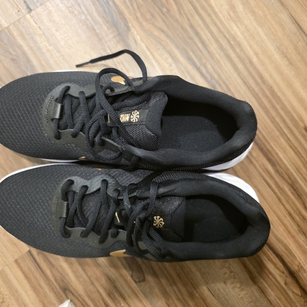 Nike Black and Gold Sneakers Sleek Design